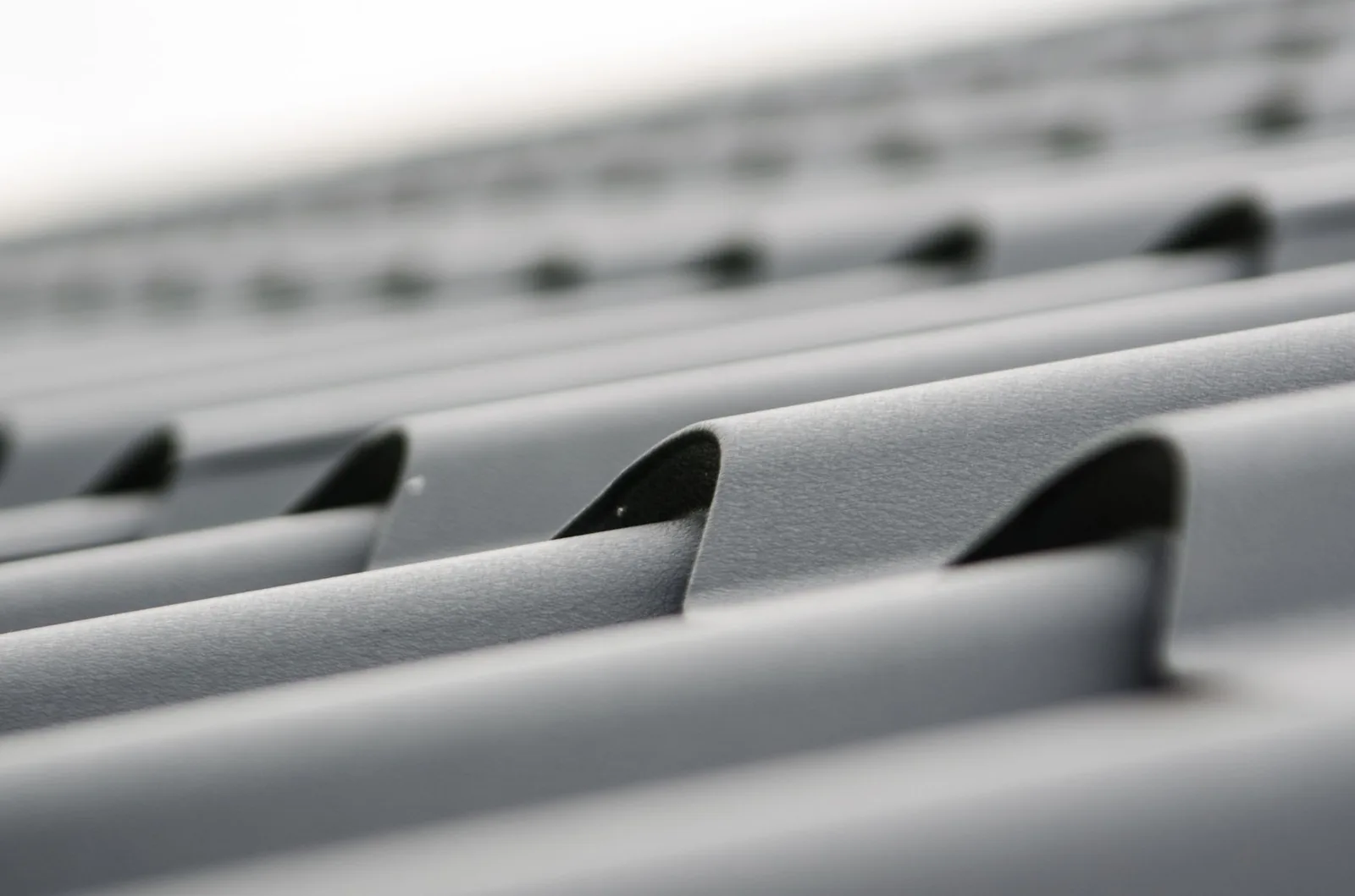 standing seam metal panels installed on a suburban home