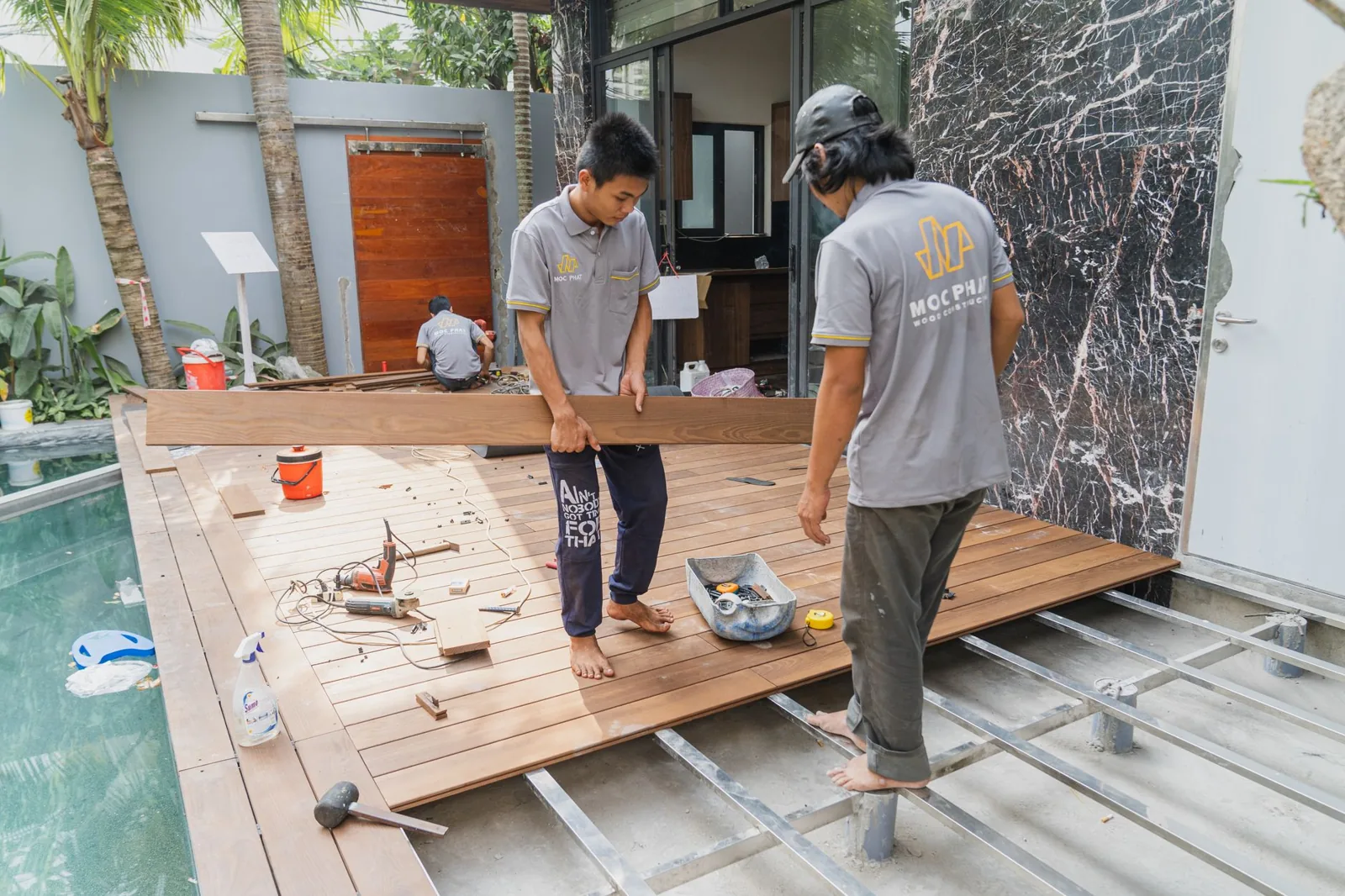 Comparison of decking boards in natural cedar and composite tones