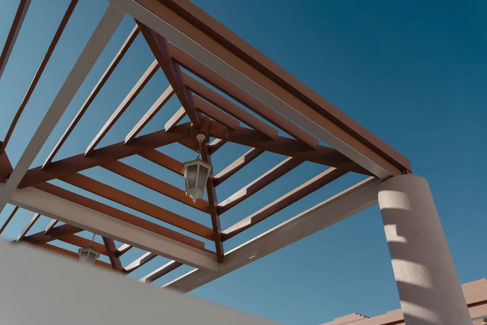 Installing rafters and purlins on a backyard pergola