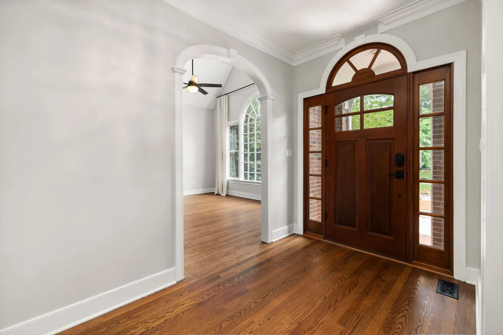 full-height front door sidelights with frosted glass on a farmhouse entry