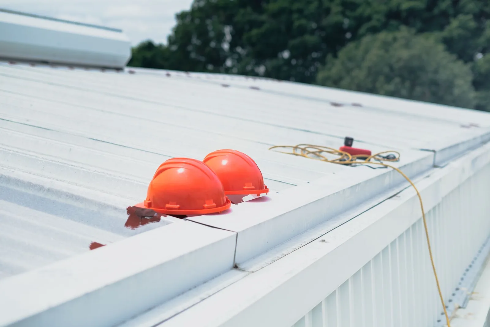 cleaning gutters with a standoff stabilizer